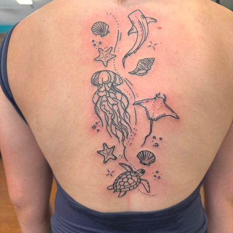 custom spine tatto by anthony