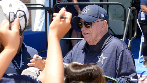 Dallas Cowboys owner Jerry Jones walks out to the press 