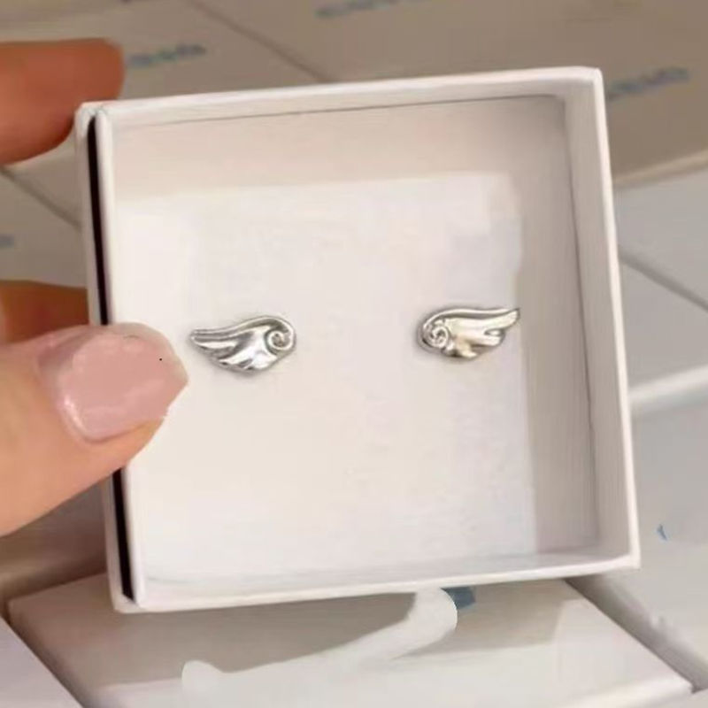 Thumbnail: The Angel Earrings