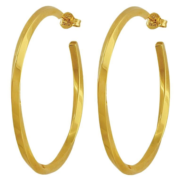 Tiffany, a pair of twist hoop earrings English hallmarked 18 ct yellow gold