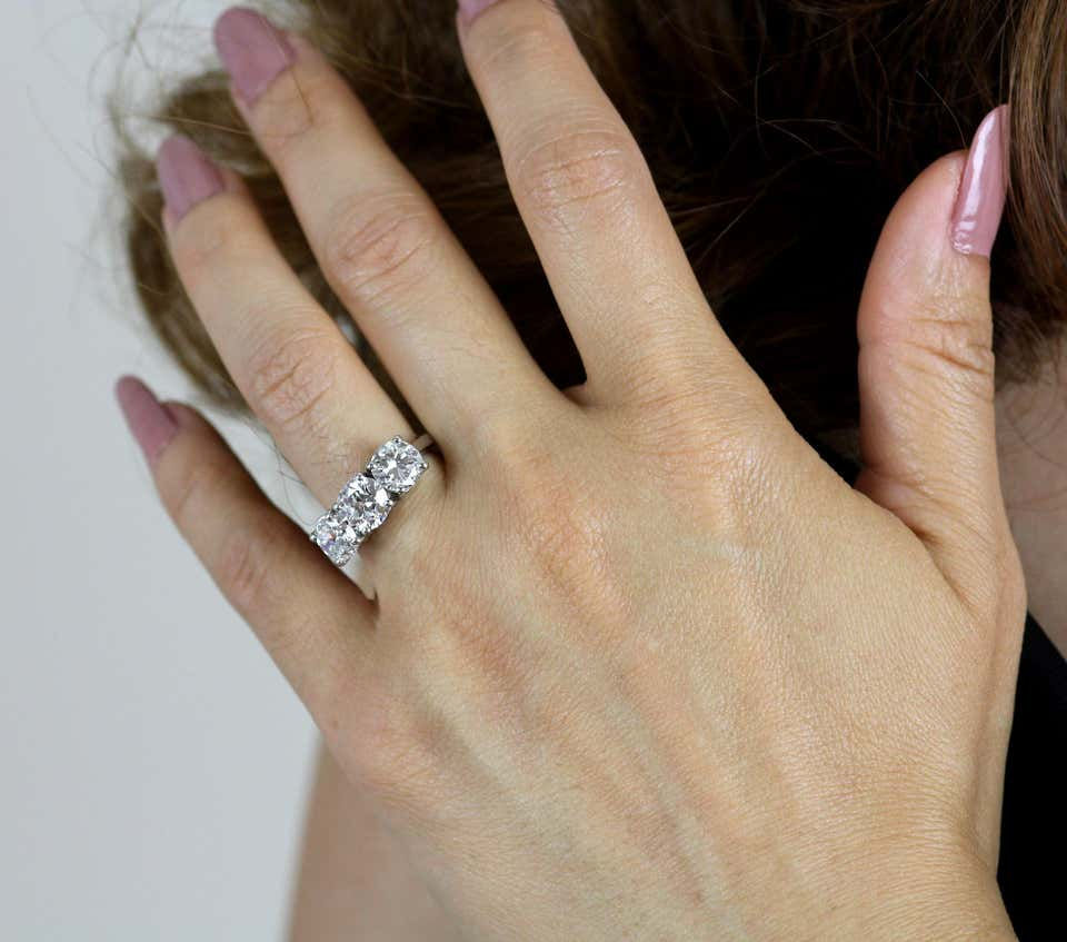 Thumbnail: Old European Cut Diamonds, Three-Stone Ring Set in Platinum