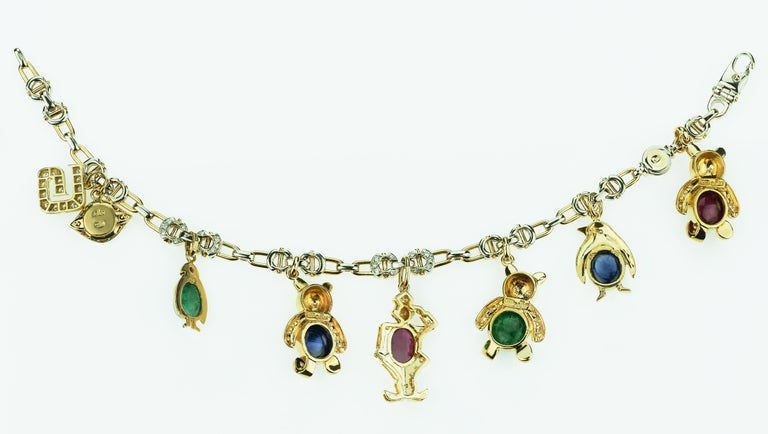 Thumbnail: Adler Charm Bracelet with Penguins, Bear, Devil Eye in Diamond, Ruby & Emerald