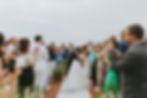 bride and groom first kiss