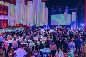 Revelers celebrate the holidays in a Glow-themed party in San Antonio. 