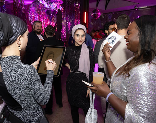 Partygoers at Braze's Disco-themed pink holiday party in New York City.