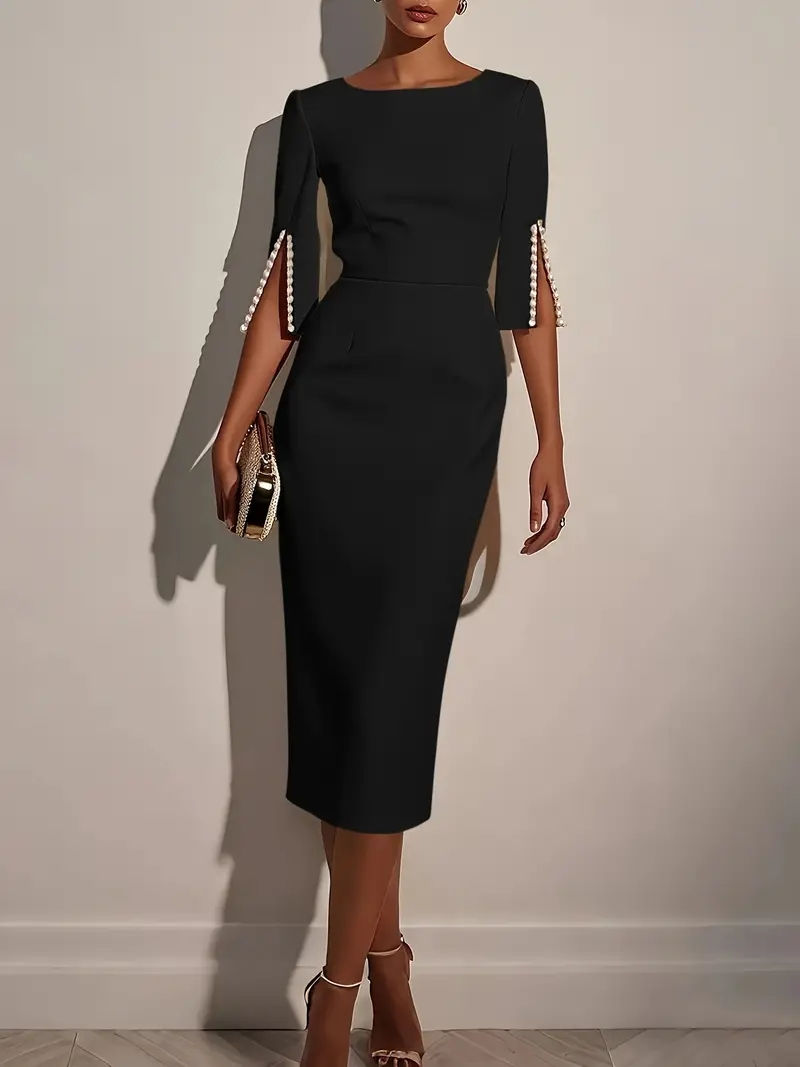 Thumbnail: An elegant dress with short sleeves and beaded detailing, in a slim-fit cut.