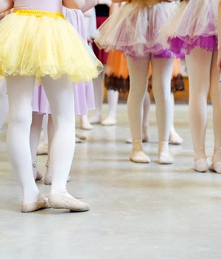 Girls ballet group in yellow and pink skirts.jpg