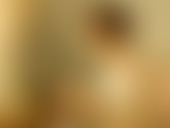 Woman sewing a pink ribbon, symbolizing the birth of the modern 