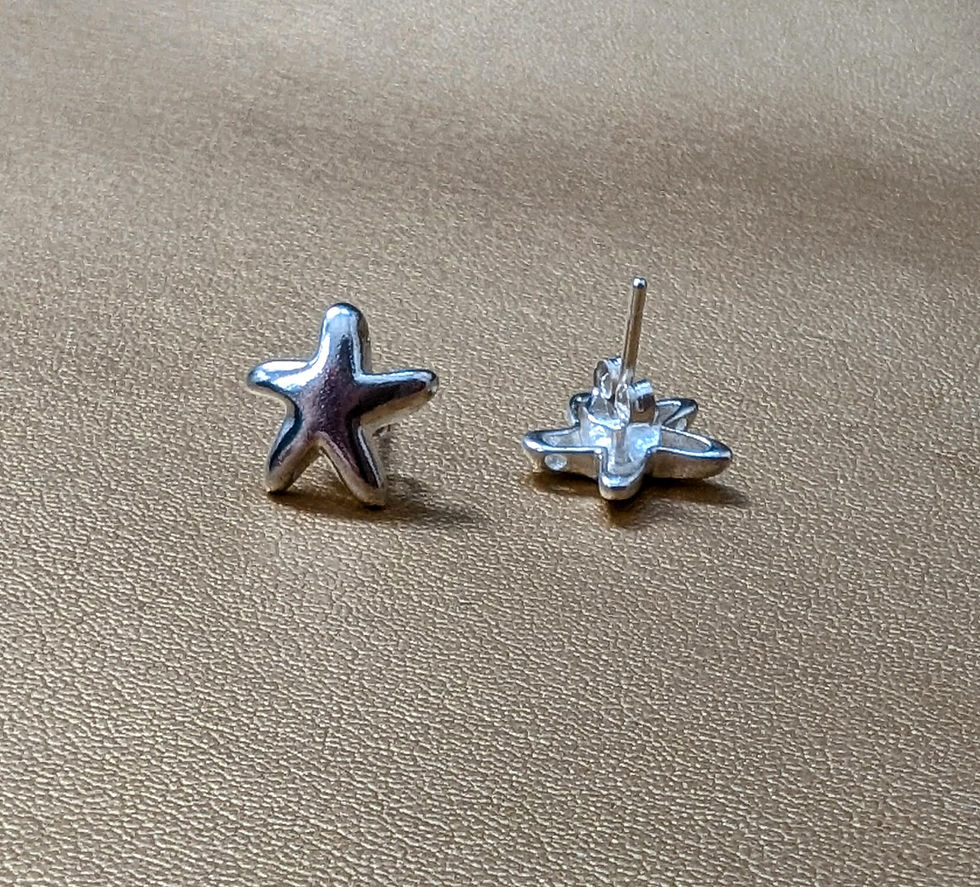 Thumbnail: Sterling silver and freshwater pearl necklace with stars and matching earrings. 