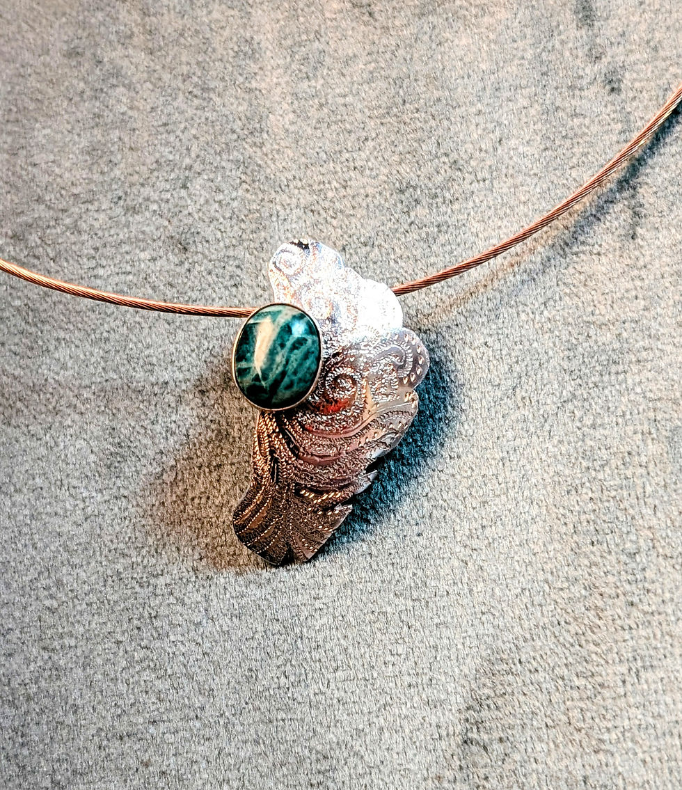 Thumbnail: Hand engraved Amazonite pendant in sterling silver. 