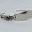 Thumbnail: Sterling silver bangle made from 1911 sugar tongs. 