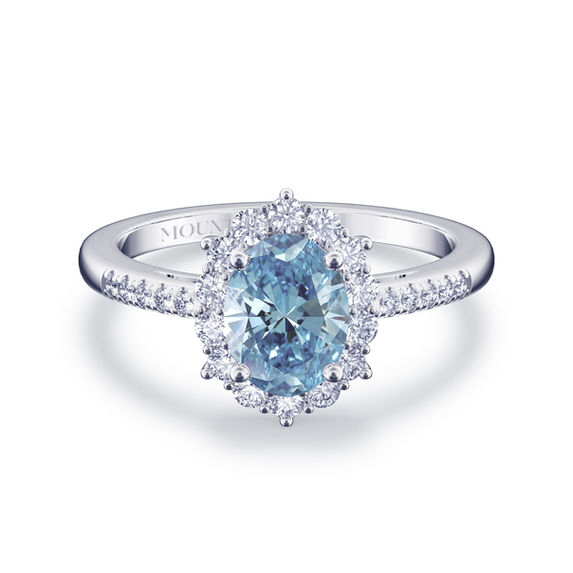 Exquisite Pave-Shank Oval Blue Diamond Ring