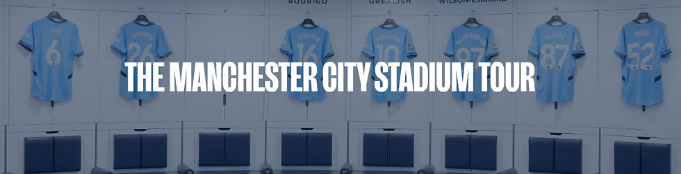Light blue football jerseys with player names hang in a locker room. Text reads "THE MANCHESTER CITY STADIUM TOUR" in bold white.