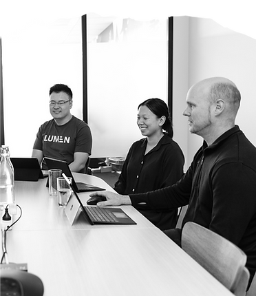 Lumen employees sitting round a table
