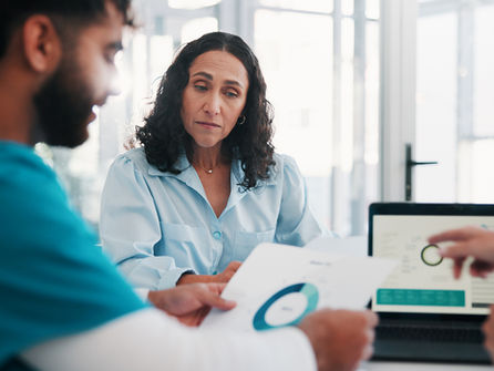 Talk, conversation and people in hospital with data analysis, discussion and technology in office