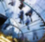 Image of people climbing glass staircase in modern office