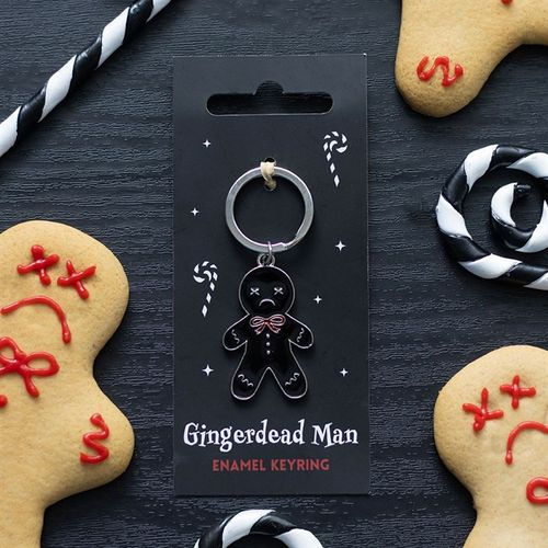 gingerdead man keyring on black backing with a black background and gingerbread man