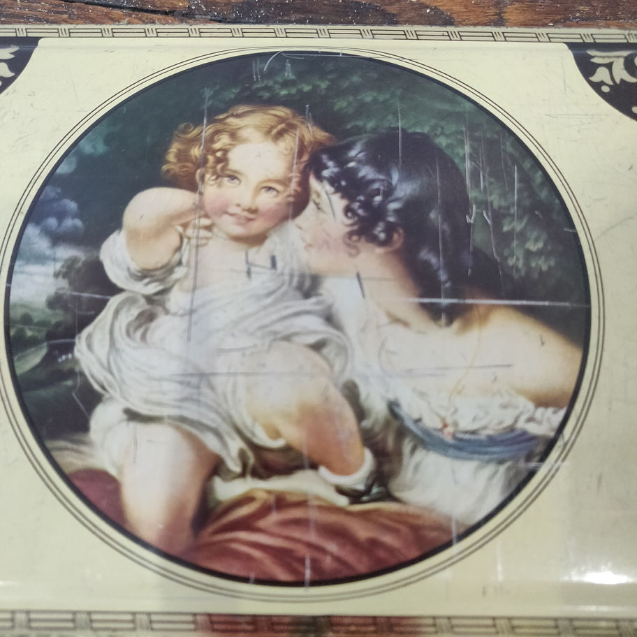 Vintage Thorns toffees lithograph tin full of vintage buttons