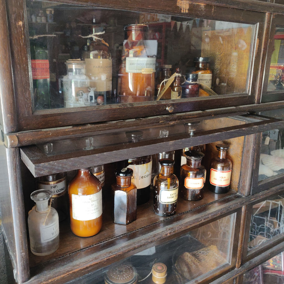 Vintage 1950s white liniment (some contents remain) apothecary/ chemist bottle