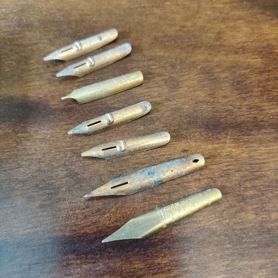 Vintage small tin skerfiercer? Fasteners full of George w Hughes pen nibs