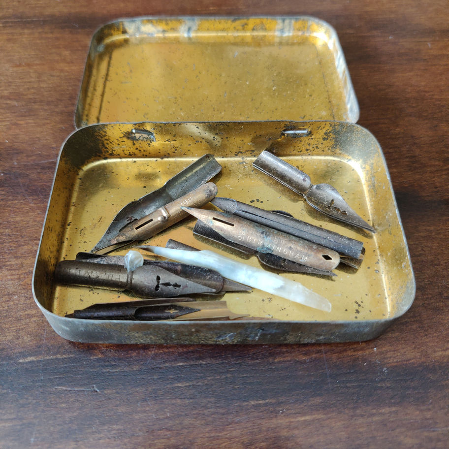 Vintage small tin skerfiercer? Fasteners full of George w Hughes pen nibs