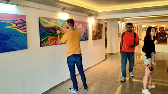 Guests and journalists at the exhibition
