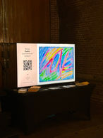 My abstract artwork, displayed on a digital screen in the exhibition space