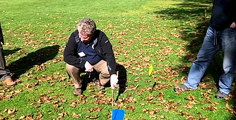 House Cleansing practitioner using acupunture to adjust earth energy line