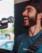 Close up shot of Mike Martin on stage with mic and guitar