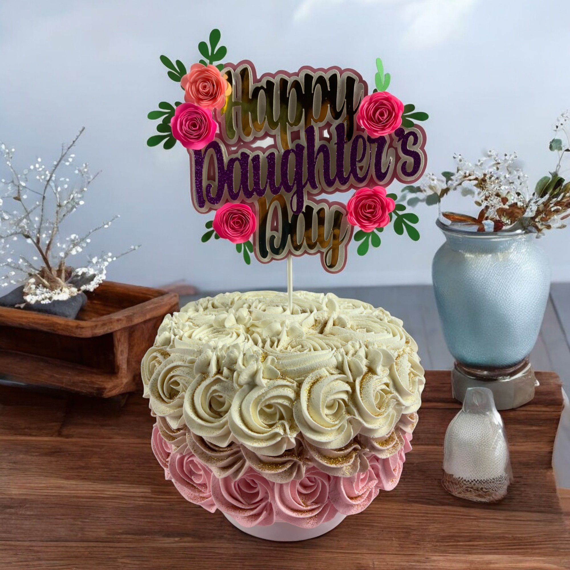 Pink Floral Cake Topper for Daughter's Day, featuring delicate leaves and flowers for a charming touch.