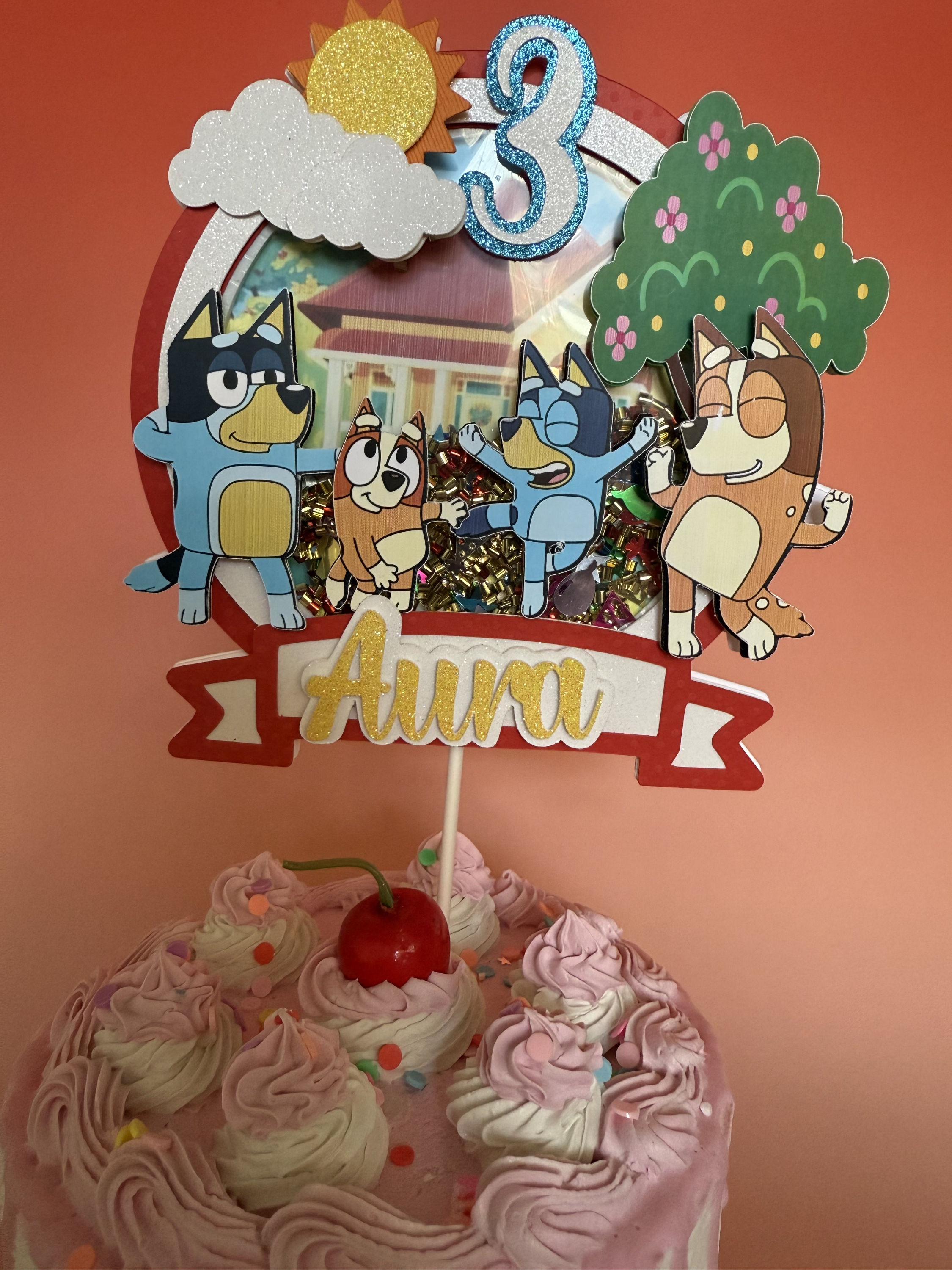 Bluey-themed cake topper featuring Bluey and Bingo, with colorful details, perfect for a fun and playful birthday celebration