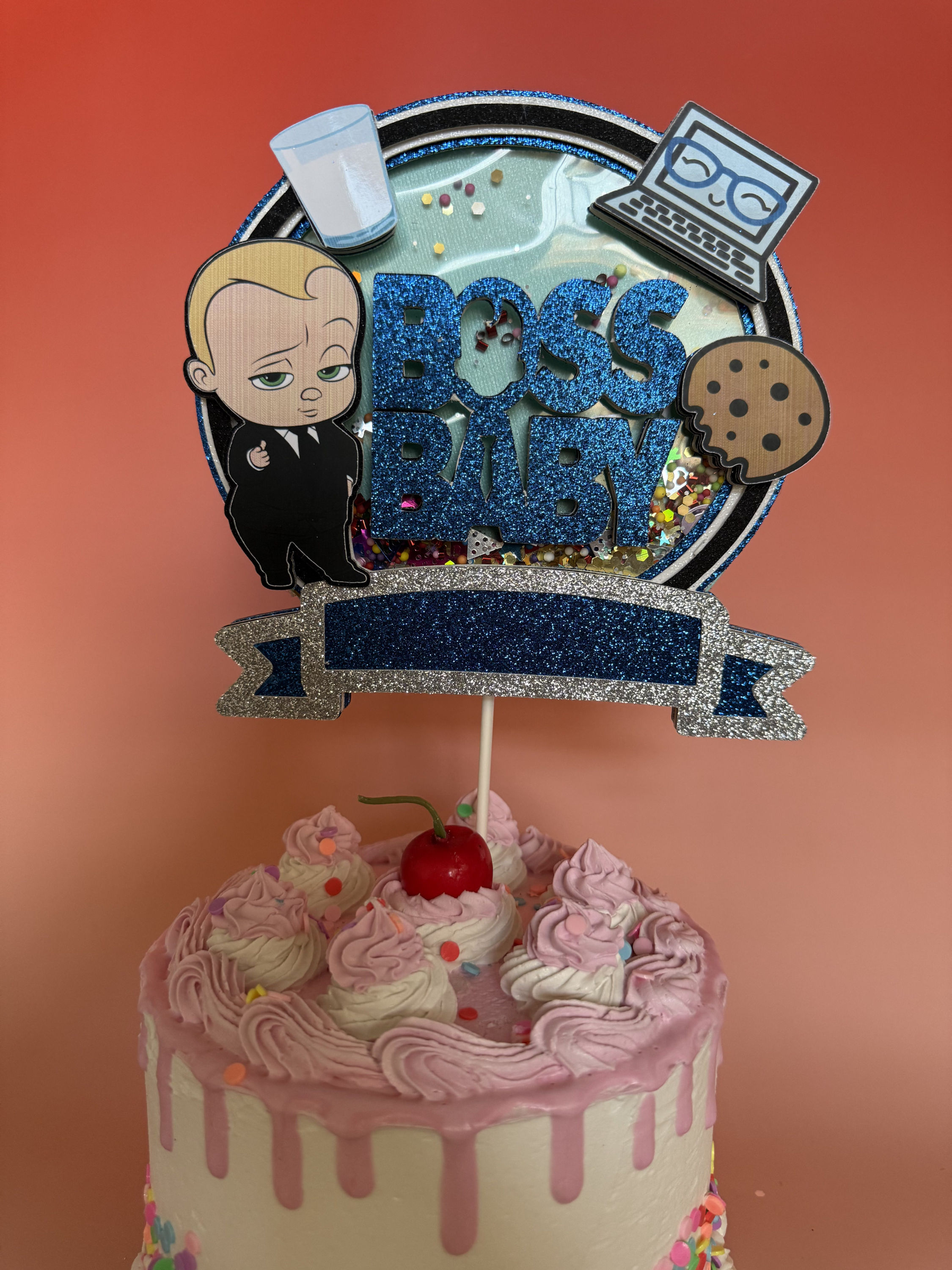 Boss Baby cake topper featuring the iconic character in a suit, with a playful and professional look, perfect for a fun birth