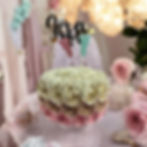 Pink and Blue Baby Shower Cake Topper with boy and girl footprints, perfect for a gender reveal celebration.