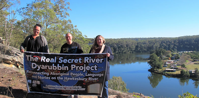 Dyarubbin project team members Leanne Watson, Erin Wilkins and Jasmine Seymour with our project banner (Grace Karskens)
