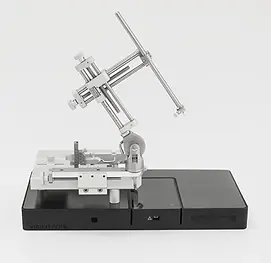 MARTA stereotax rat with MARTA pad inserted for vital sign monitoring during rat stereotactic surgery with frame and 3-axis arm.