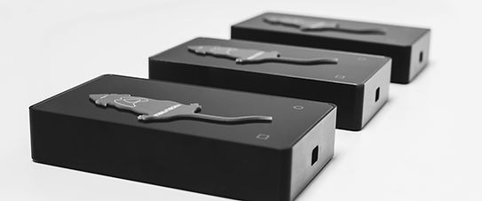Three MARTA pads in a row with artificial mice, demonstrating parallel monitoring of multiple animals simultaneously.