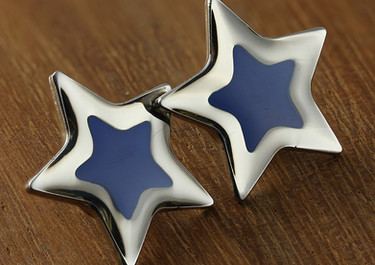 Silver star pin badge with blue star inset