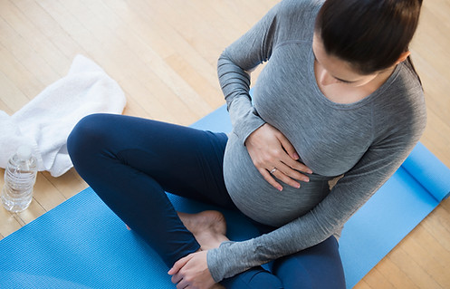 Pregnant Woman Practicing Yoga