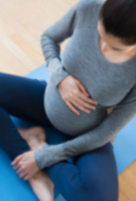 Pregnant Woman Practicing Yoga