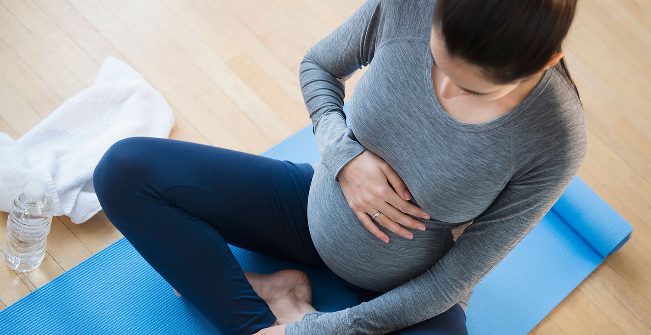 Pregnant Woman Practicing Yoga