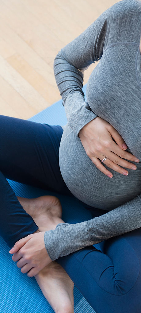 Pregnant Woman Practicing Yoga