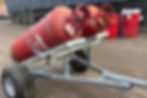 Thumbnail: Gas Bottle Trailer with a red gas bottle in transit
