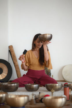 Sound healing session using a singing bowl for vibration and relaxation