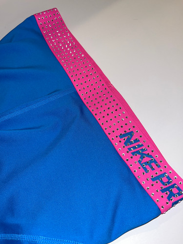 pink and blue nike pros
