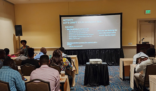 Dr. Shana Stoddard presenting a workshop to professionals and graduate students