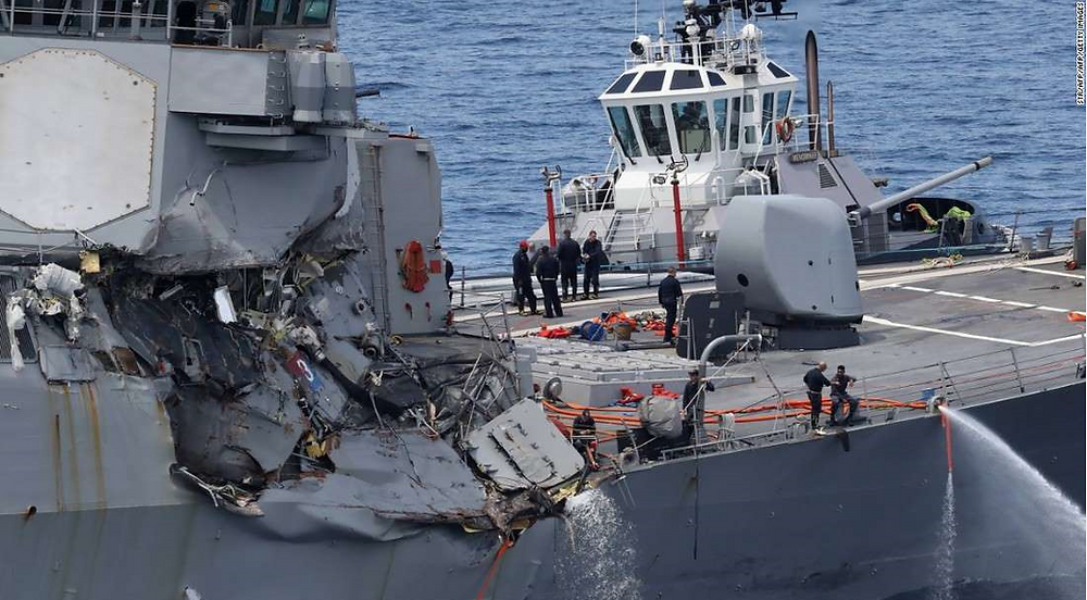© STR/AFP/AFP/Getty Images This picture shows damages on the guided missile destroyer USS Fitzgerald off the Shimoda coast after it collided with a Philippine-flagged container ship on June 17, 2017.