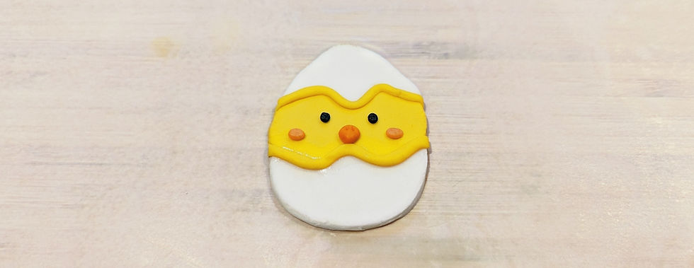 A completed cupcake topper design.