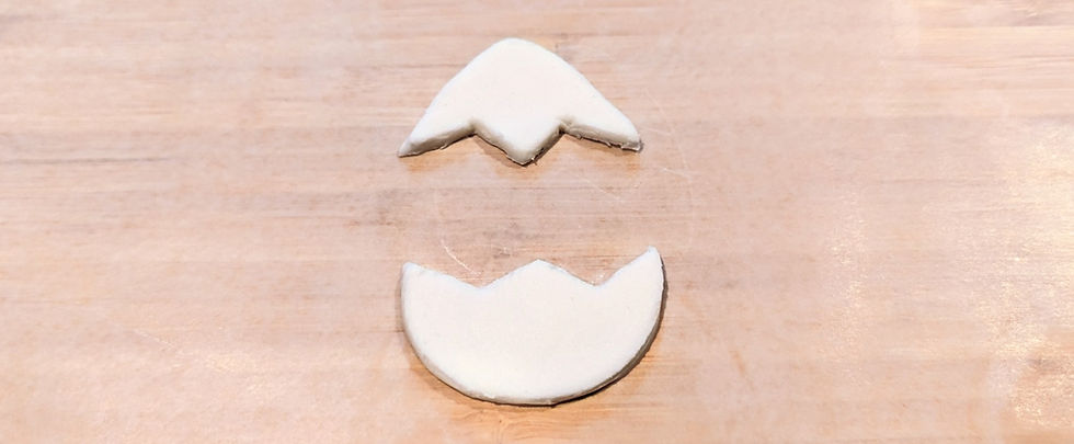 Two halfs of a fondant eggshell.