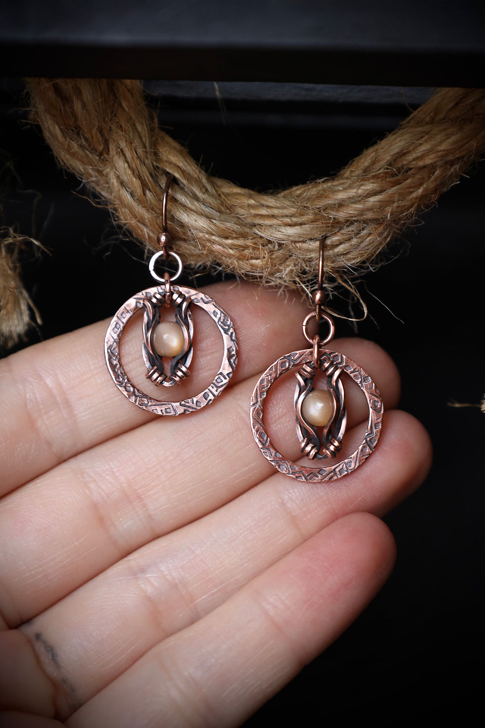 Thumbnail: Cats Eye Peach Moonstone Textured Boho Earrings in Copper