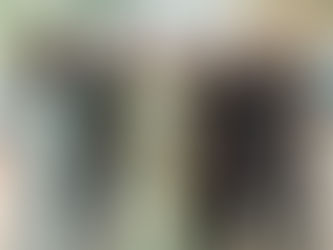 Mrs. Anitha Manickam standing with students